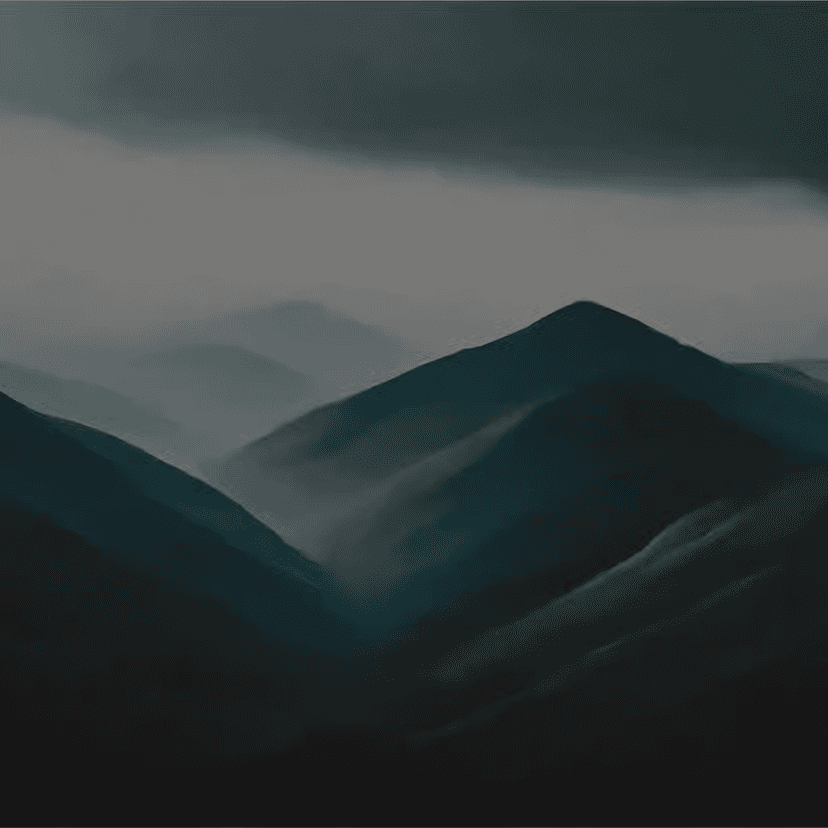 Dark, moody mountain landscape with misty valleys and dramatic peaks